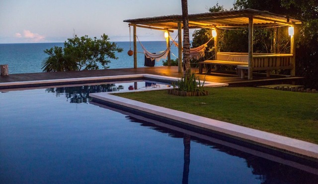Exclusive house in Arraial d'Ajuda: 7 bedrooms, sea view and modern rustic design.