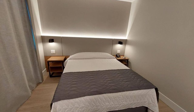 Experience Relaxed Functionality in Modern Room Near City Highlights in Chapeco