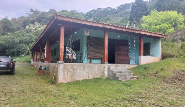 Farm with a stream and trail with access to a waterfall and natural pool.