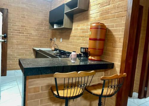 Flat com 2 quartos 2 banh AR e uma vista espetacular na área central de GV com cozinha completa-Bom p grupos ou familias ou empresas