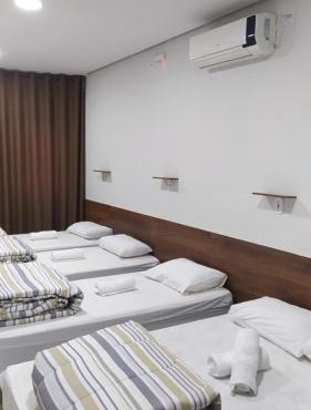 Flat familiar com ar,wi fi,cozinha e garagem
