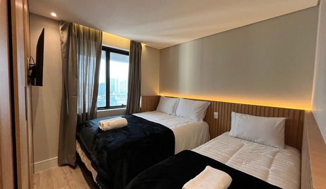 Flat Hotel 4 estrelas próx. Aeroporto GRU até 6p