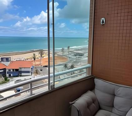 Flat praia a beira-mar