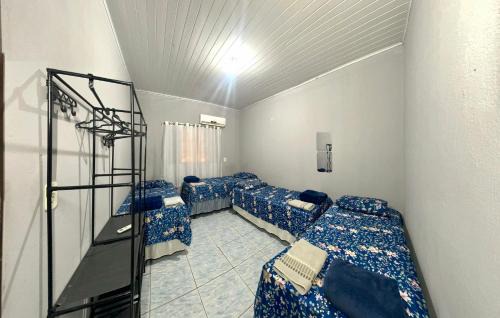 Hospedagem Trevisan casa com 3 quartos e garagem de 1 a 10 pessoas