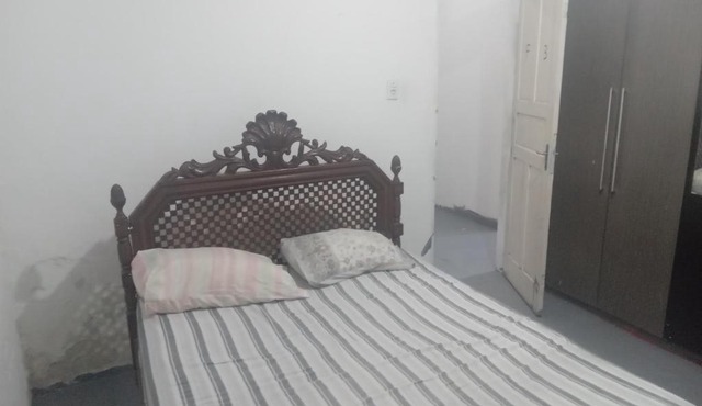 Hostel Leonardo Quarto com cama de casal