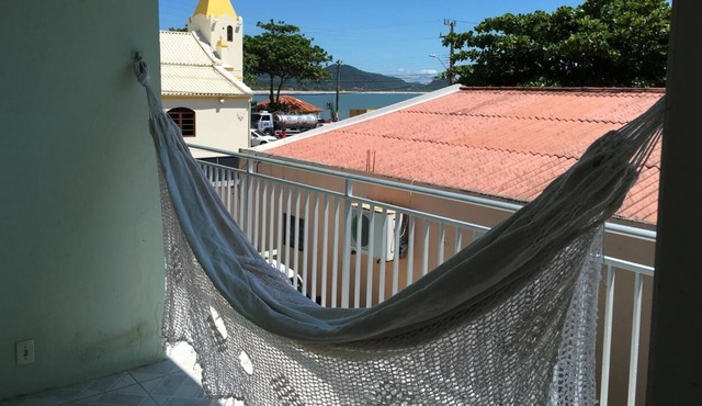 House in Armação beach 30m from the beach with a beautiful view.