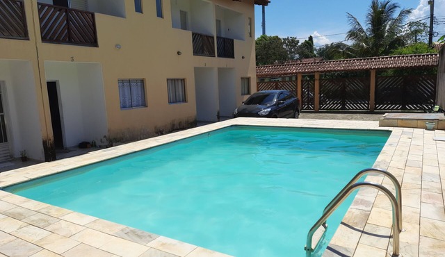 House with pool and barbecue in Caraguatatuba, in a gated community with Wi-Fi.