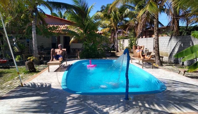 House with pool on the beach