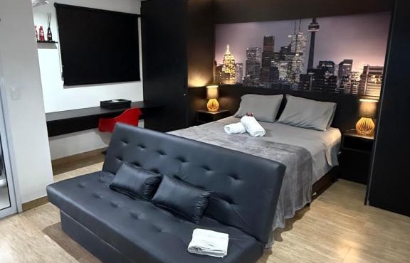 Loft aconchegante com varanda Campolim
