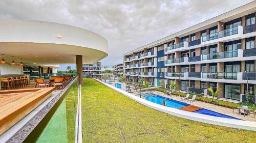 Makia Beach Experience | Flat Resort em Muro Alto – Piscinas e Praia