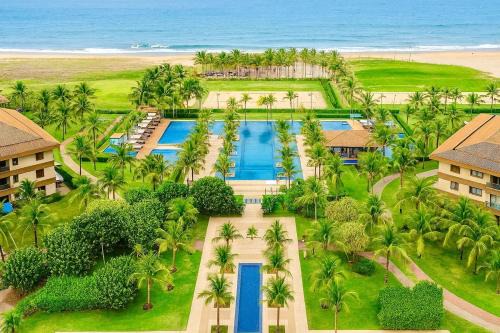 Mandara Lanai - Apto 101, bloco 12 - 2quartos, 3 wcs - Porto Dunas, pé na areia