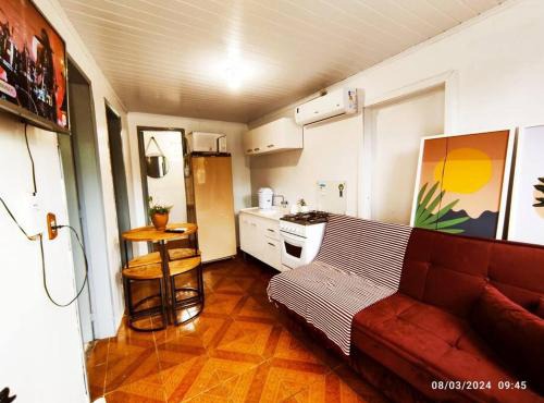 Microcasa com vista para o Cristo