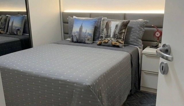 Modern, comfortable, air-conditioned apartment with a gourmet area and gym.
