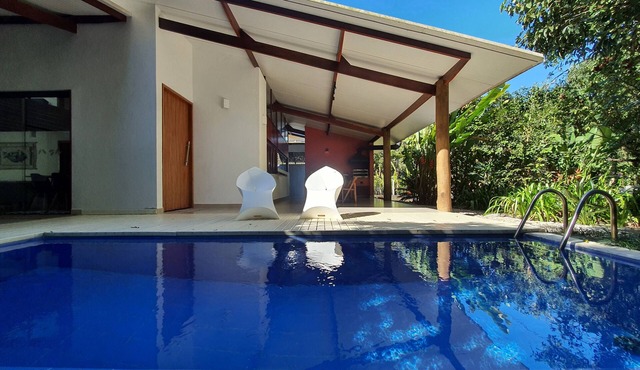 Modern house with pool for seasonal rental on Itamambuca Beach.
