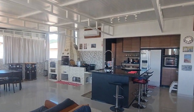 Modern penthouse with gourmet kitchen 300 meters from the beach