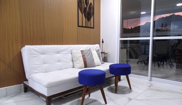 New apartment with balcony and air conditioning, one block from the beach