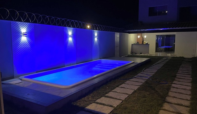 New, cozy house with a beautiful pool and barbecue area.