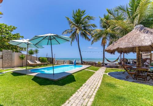 Paraíso de Tabuba - casa de aluguel por temporada - 32km de Maceió-AL - Pé na areia - 24h de Frente para o mar