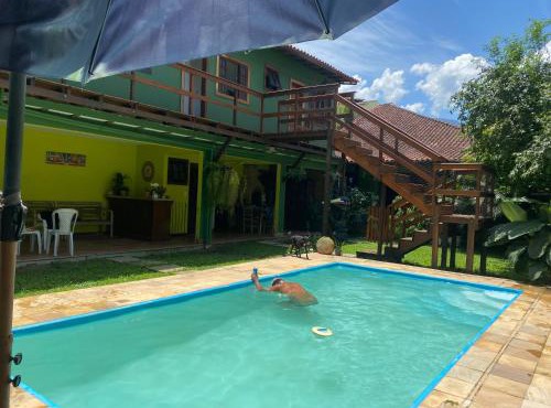 Pousada Casa de mãe aconchegante com piscina próximo à praia