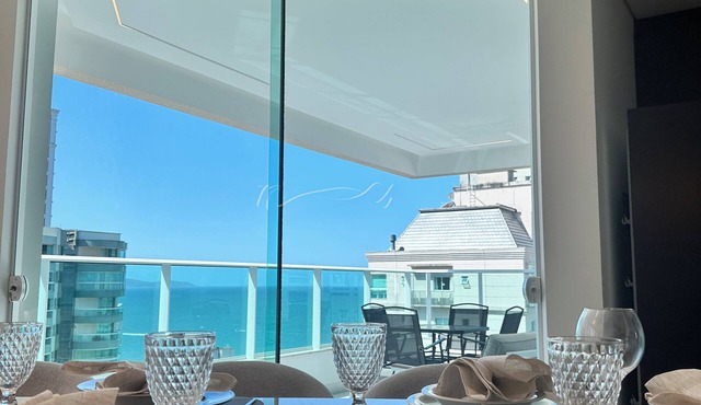 Premium Ocean View Penthouse in Meia Praia - 12th floor, high standard, one block from the beach.