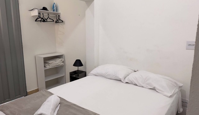 Private studio with TV and private bathroom.