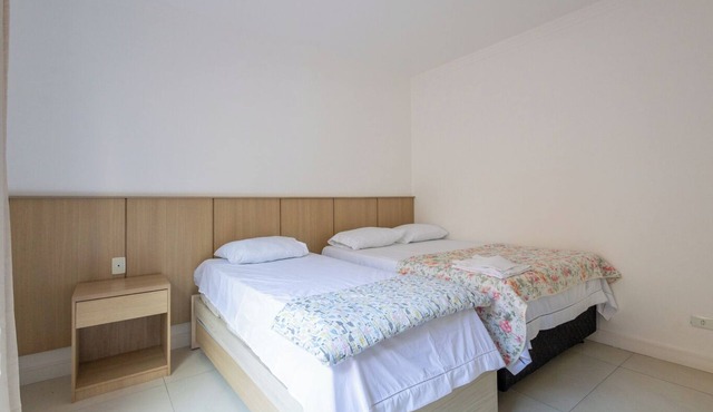 Quarto à 300m do mar com Wi-Fi e ar-condicionado