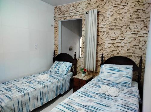 Quarto 2 camas de Solteiro