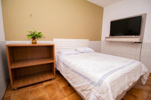 Quarto amplo ao lado do mar