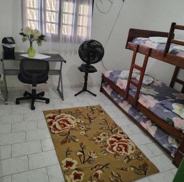 Quarto com 3 camas