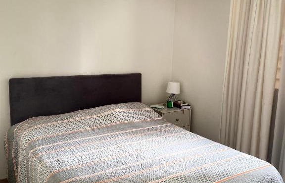 Quarto em apartamento no centro