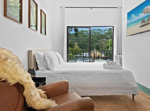 Quarto em Pousada com Varanda Frigobar Wi-Fi Garagem