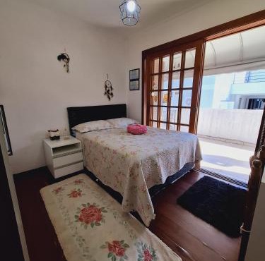 Quarto familiar na cidade do Cristo