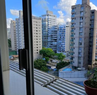 Quarto no apartamento do anfitrião na Praia do Canto