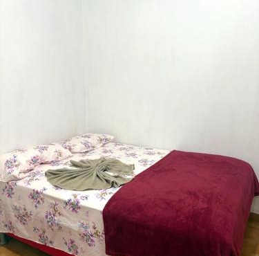 Quarto no centro 309