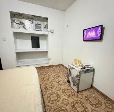 Quarto privado no centro 103