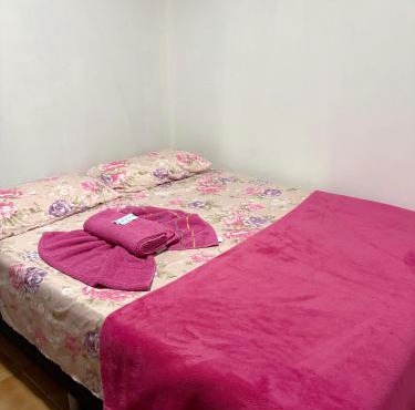 Quarto privado no centro 313