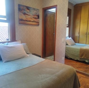 Quarto Suite -Em apartamento familiar
