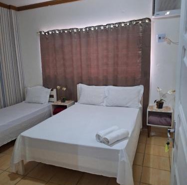 Quarto triplo com banheiro em Pousada e Restaurante