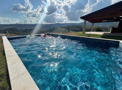 Refúgio na montanha com piscina aquecida em Extrema