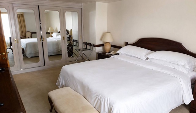 Relax in Style Near Shopping, Dining & Theater Spots | Onsite Rooftop Pool