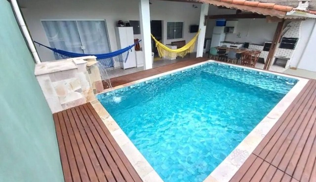 Relaxation and home office with a pool in Itanhaém