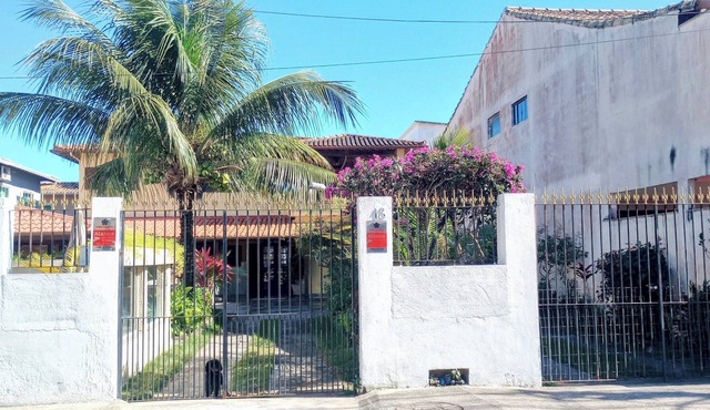 Single-story linear house with swimming pool in Atlântico.