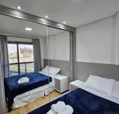Studio com Garagem e Piscina Aquecida Centro