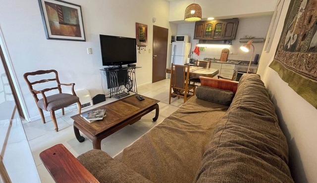 Studio featuring a private terrace with a grill