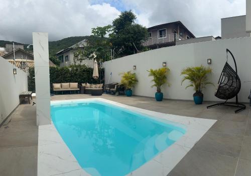 Suítes De Pádua - Quartos com banheiro privativo em casa ampla e completa em Santo Antônio de Lisboa - Florianópolis - SC - BR