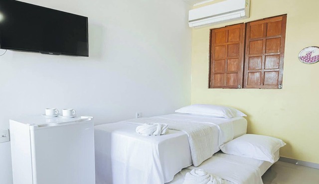 Suite em Guriri Norte com Piscina e Academia