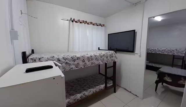 Suite with air conditioning and kitchen