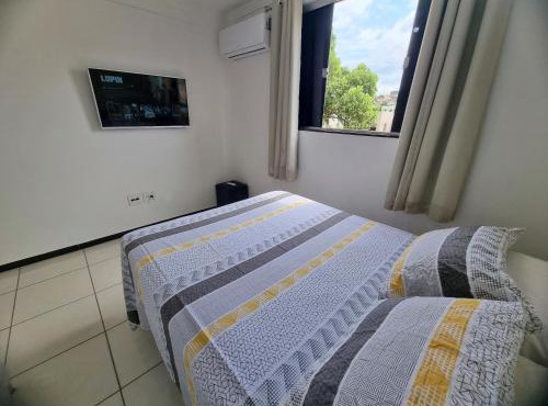 TH 3102 - Flat de 2 quartos com varanda