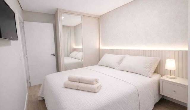 Top apartment, 4 minutes from the covered street by car, kids' area, heated pool, gym.