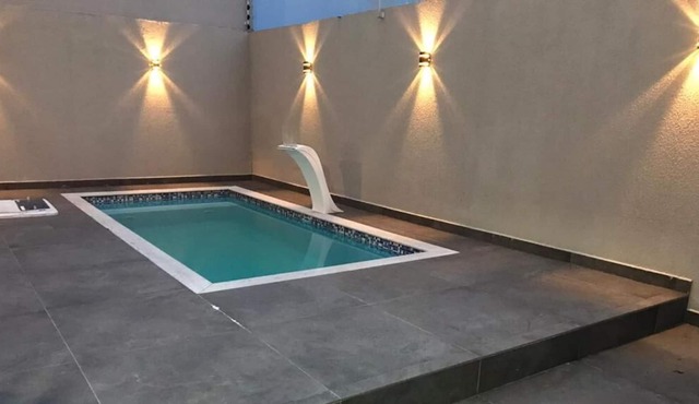 Triplex house with pool and games room